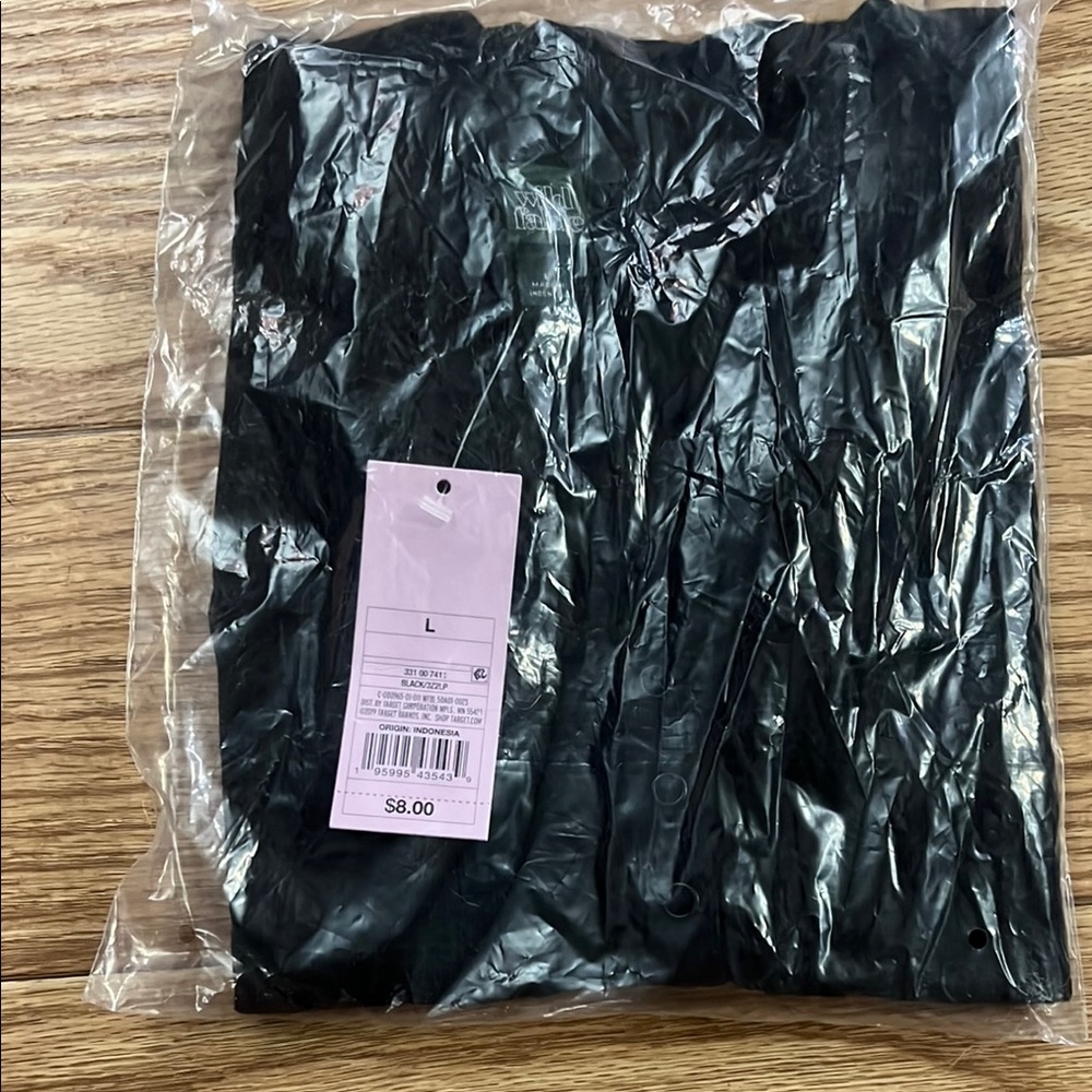 Black Clothing Item in Packaging